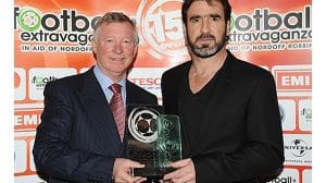 Eric Cantona receives award from Alex Ferguson