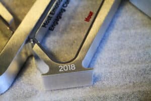 close-up of engraving on lfoot of award saying'2018'